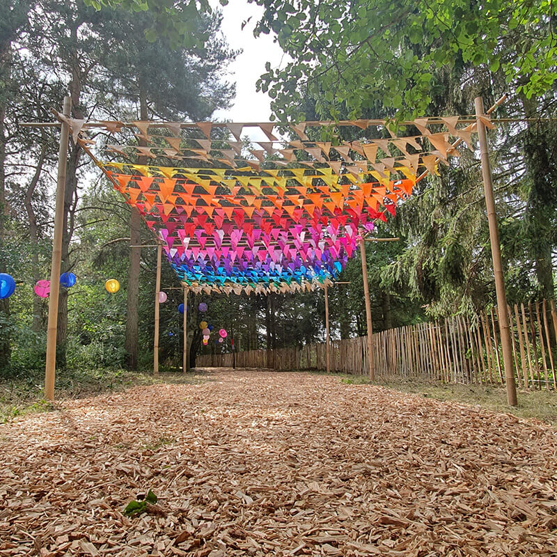 A walkway decorated with bunting.