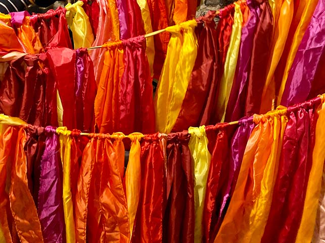 Raggle Taggle bunting for festivals in reds and yellows
