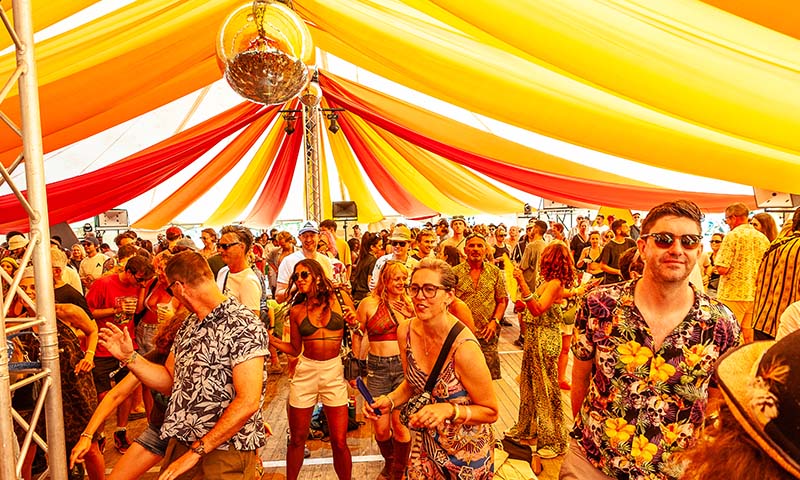 drapes for eves drop collective in a festival marquee