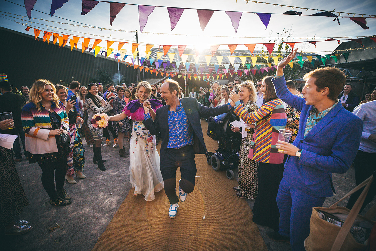 wedding colour trends 2026 in bunting in golds reds purples